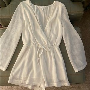 Boutique romper in white